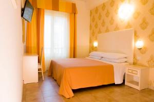 Postel nebo postele na pokoji v ubytování Hotel Ariston Riccione