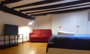 TV a/nebo společenská místnost v ubytování Giudei House Bologna