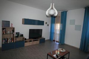 TV a/nebo společenská místnost v ubytování B&B Libellula