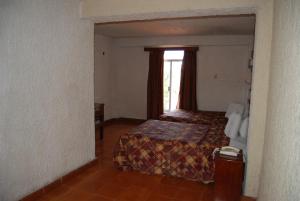 Postel nebo postele na pokoji v ubytování Hotel Tankah Cancun