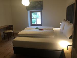 Postel nebo postele na pokoji v ubytování Apartment Der Riese