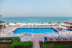 
Вид на бассейн в Sharjah Carlton Hotel или окрестностях
