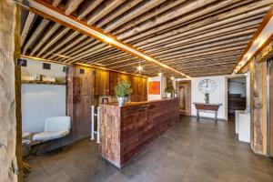 TV a/nebo společenská místnost v ubytování Chalet Hotel Du Fornet