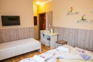 Postel nebo postele na pokoji v ubytování Penzión Stefarez New