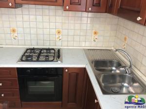 a kitchen with a stove and a sink at Magi - Ulivo in Ponza