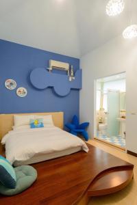 Postel nebo postele na pokoji v ubytování Ming Shui Lu Homestay