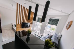 Część wypoczynkowa w obiekcie Hypnotize Apartment