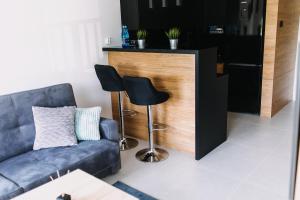 Część wypoczynkowa w obiekcie Hypnotize Apartment