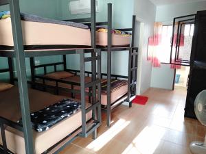 Postel nebo postele na pokoji v ubytování Chandra Hostel Koh Tao