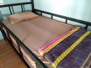 Postel nebo postele na pokoji v ubytování Chandra Hostel Koh Tao