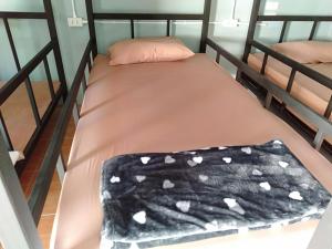 Postel nebo postele na pokoji v ubytování Chandra Hostel Koh Tao
