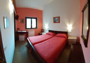 Ліжко або ліжка в номері Locanda al Giglio d'Oro
