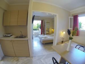 Posteľ alebo postele v izbe v ubytovaní Happyland Hotel Apartments