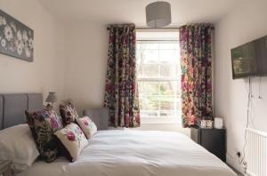 Katil atau katil-katil dalam bilik di Strathallan Guest House