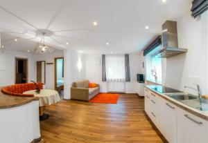 TV a/nebo společenská místnost v ubytování Residence Brunello