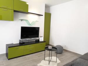 TV in/ali zabaviščno središče v nastanitvi Apartment VB Split