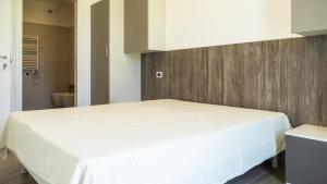 A bed or beds in a room at IdeaLazise Camping and Village