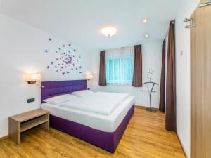 Postel nebo postele na pokoji v ubytování Residence Brunello