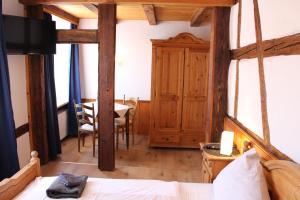 Postel nebo postele na pokoji v ubytování Gasthaus Sonne