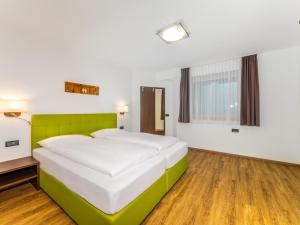 Postel nebo postele na pokoji v ubytování Residence Brunello