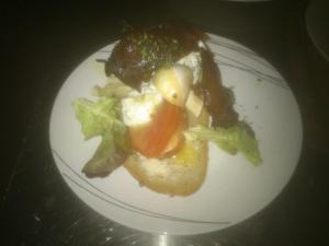 a plate of food with vegetables on it at Pension Alpenstern in Oberau +32 photos