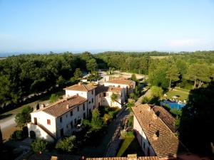 an aerial view of a house with a pool at Apartments Borgo Toscano in Gambassi Terme