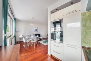 Kuchyňa alebo kuchynka v ubytovaní Apartamenty Sun&Snow Marina Primore