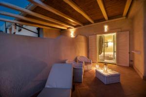 Posezení v ubytování Therasia Resort Sea and SPA - The Leading Hotels of the World