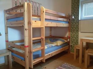 Кровать или кровати в номере Ferienhaus Rustica +4 фотографии