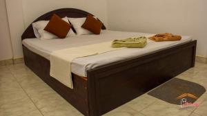 Säng eller sängar i ett rum på Gamagedara Resort