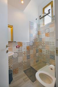 Koupelna v ubytování Luigino B&B