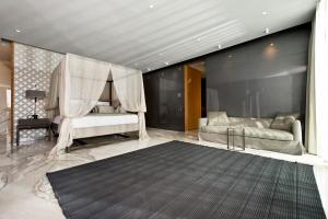 Кровать или кровати в номере D Maris Bay