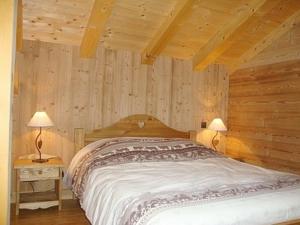 L'Erine des Alpes SPA Chalet individuel grand confortにあるベッド