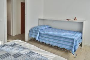 Postel nebo postele na pokoji v ubytování Casa Comisso
