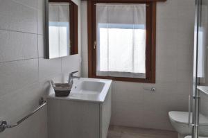 Koupelna v ubytování Casa Comisso