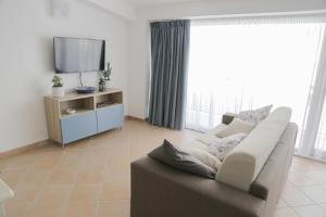 TV a/nebo společenská místnost v ubytování Casa Diletta