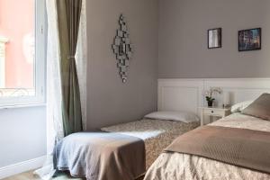 Posteľ alebo postele v izbe v ubytovaní Monti49 GuestHouse
