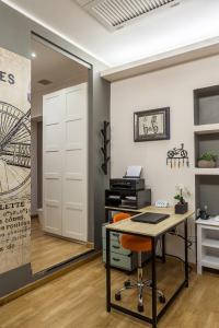 Televízia a/alebo spoločenská miestnosť v ubytovaní Monti49 GuestHouse