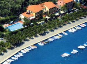 an aerial view of a bunch of boats in a harbor at Hotel Della Baia in Portovenere