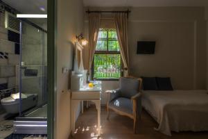 Postelja oz. postelje v sobi nastanitve Hotel Kalehan