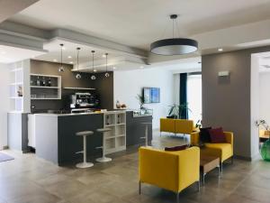 Kuchyň nebo kuchyňský kout v ubytování Hotel Belsito