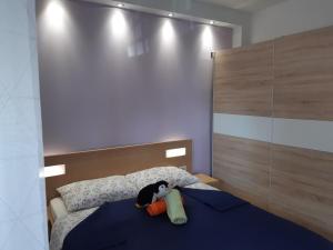 Ένα ή περισσότερα κρεβάτια σε δωμάτιο στο Apartments Nives