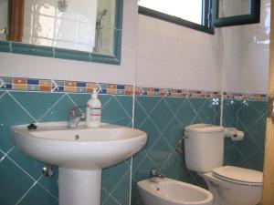 Koupelna v ubytování Apartamento Arriondas + 16 fotografií