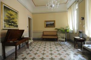 Posezení v ubytování A Palazzo Busdraghi Residenza D'Epoca