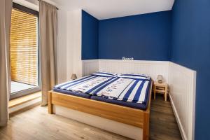 Postel nebo postele na pokoji v ubytování Penzion Labska Marina