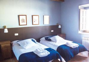 Postel nebo postele na pokoji v ubytování Casa Rural La Torrecilla con PISCINA PRIVADA