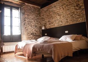 Postel nebo postele na pokoji v ubytování Casa Rural La Torrecilla con PISCINA PRIVADA