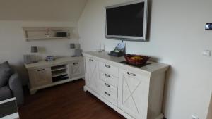 Telewizja i/lub zestaw kina domowego w obiekcie Apartman Erika Lipno