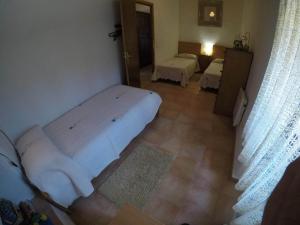 Postel nebo postele na pokoji v ubytování Apartamento en pleno Montseny Mas Romeu Turisme Rural