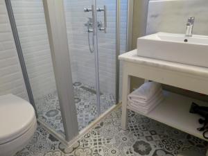 Kopalnica v nastanitvi Hotel Kalehan